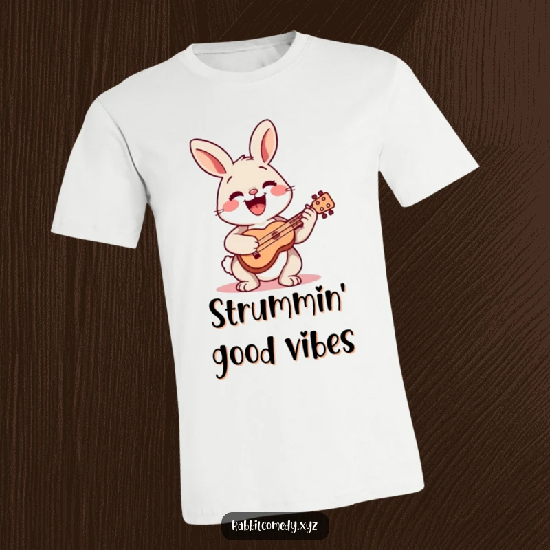 Funny t-shirt showcasing a happy rabbit character playing a small ukulele with an infectious wide smile.