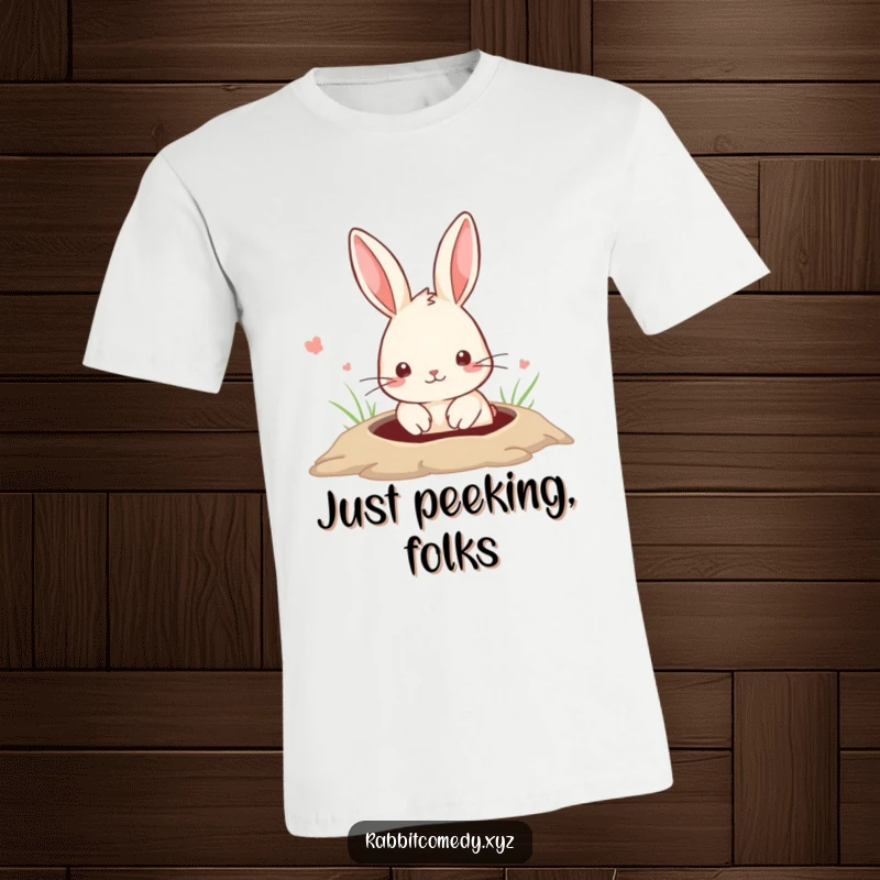 Funny T-Shirt with a cute rabbit peeking adorably out of a hole in the ground, offering a glimpse of playful charm.